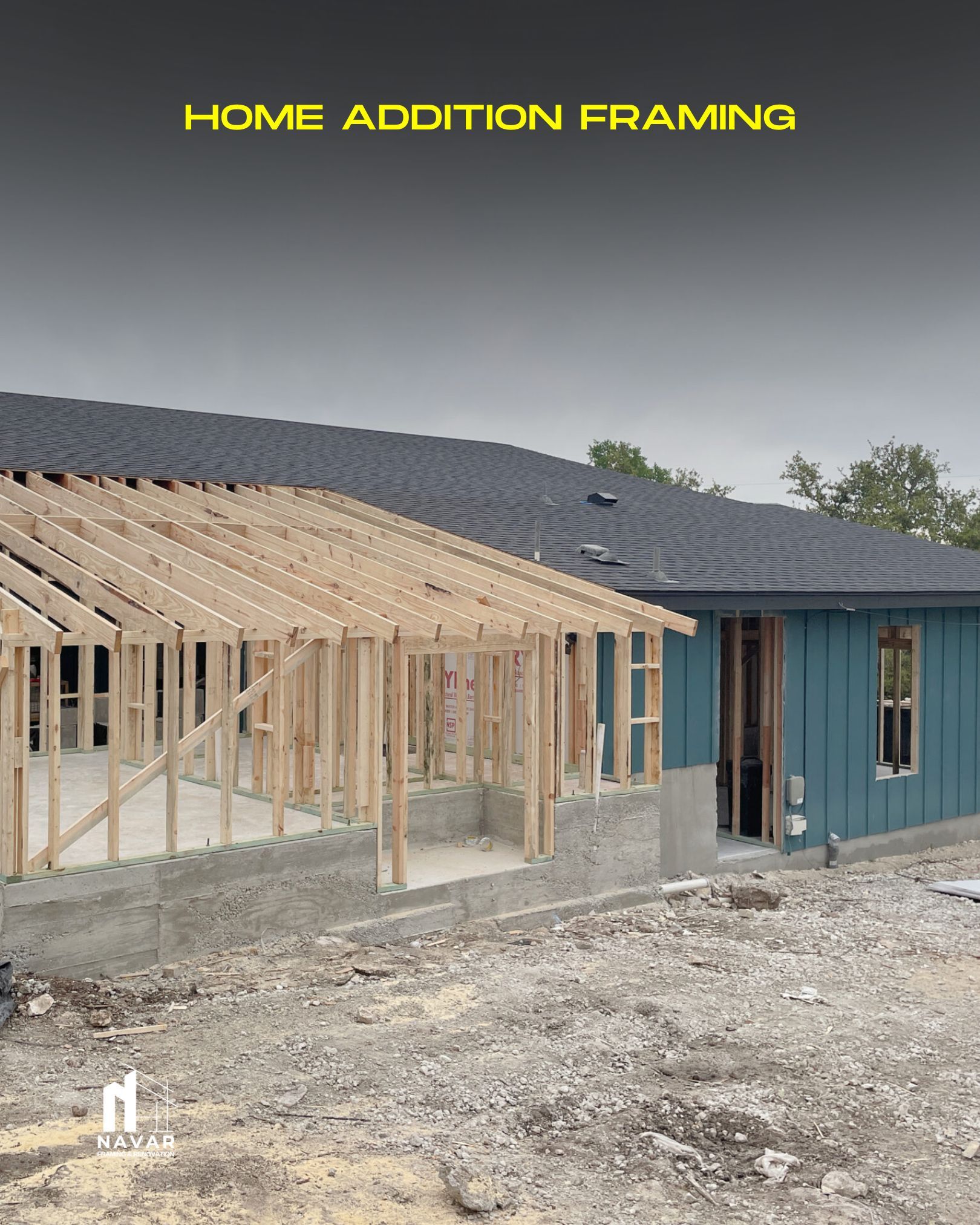 Structural framing of a home extension with engineered beams and studs.